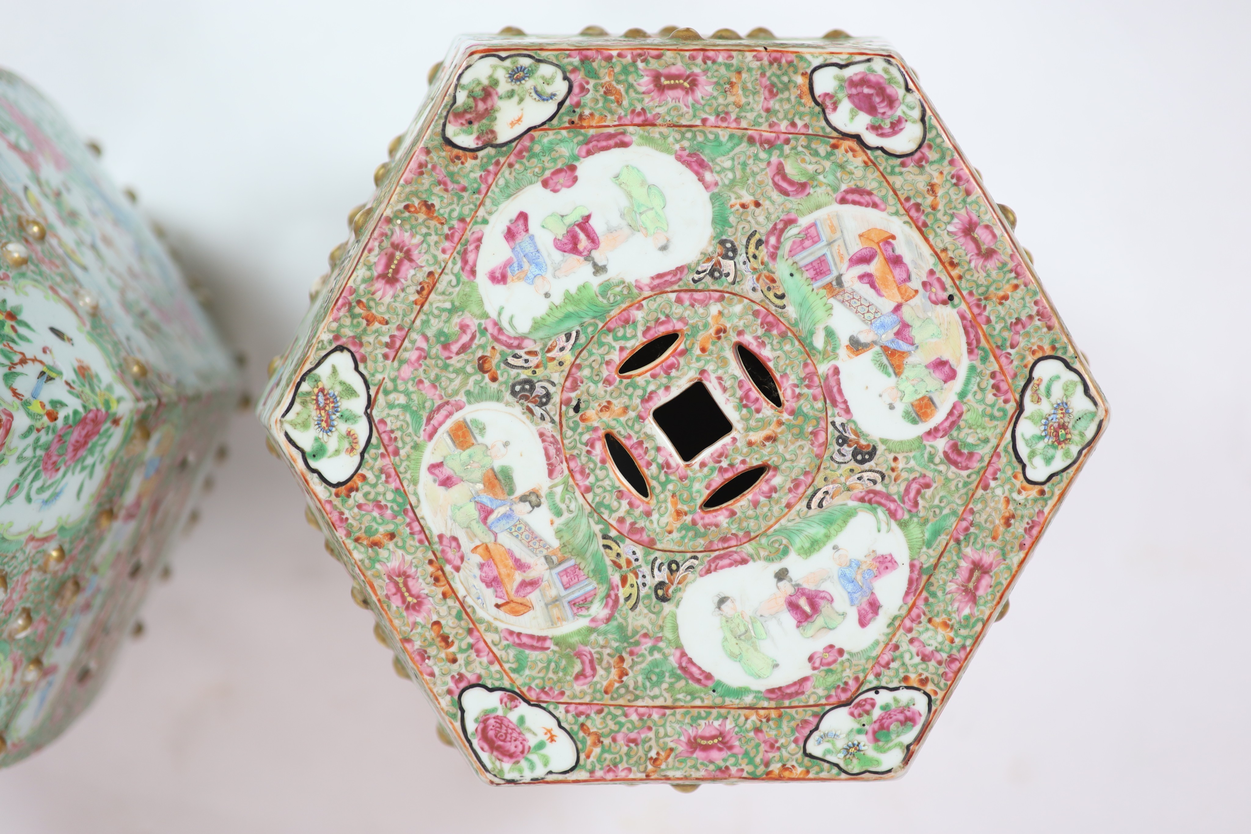 Two similar Chinese famille rose hexagonal garden seats, c.1830-50, 47 cm high